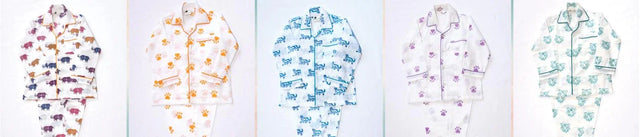 Boys organic cotton animal print pajamas by Dhonk Craft, handcrafted in colorful wildlife patterns