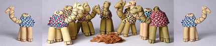 Handcrafted camel toys with colorful woven blankets by Dhonk Craft artisans