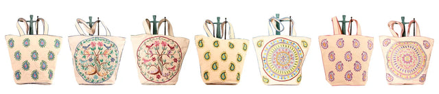 Handcrafted organic cotton tote bags with colorful, nature-inspired embroidery by Dhonk Craft