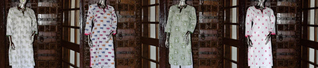 Handcrafted organic cotton kurtas by Dhonk Craft on mannequins, featuring wildlife prints
