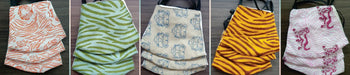 Handcrafted organic cotton face masks with tiger and animal prints by Dhonk Craft artisans