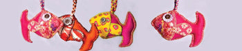 Handcrafted colorful fabric fish toys by Dhonk Craft artisans, ethical home decor.