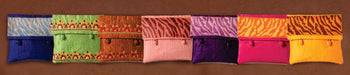 Colorful handcrafted purses with animal and floral patterns by Dhonk Craft artisans