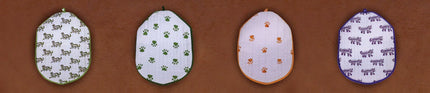 Handcrafted hot water bottle covers with animal and paw print designs, Dhonk Craft home decor
