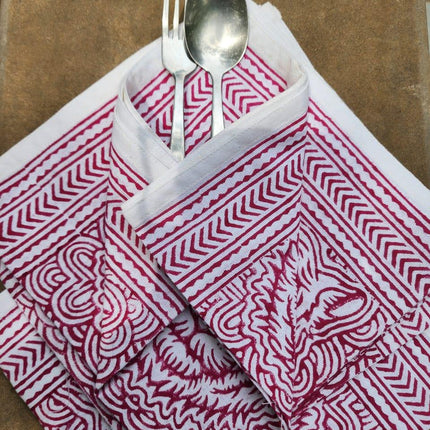 Handcrafted red and white block print cotton napkin folded with spoon and fork, Dhonk Craft