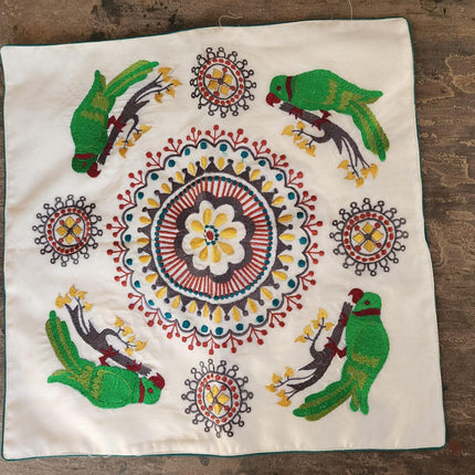 Handcrafted organic cotton cushion cover with embroidered birds and floral mandala, Dhonk Craft