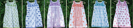 Handcrafted organic cotton kids frocks with colorful wildlife prints by Dhonk Craft