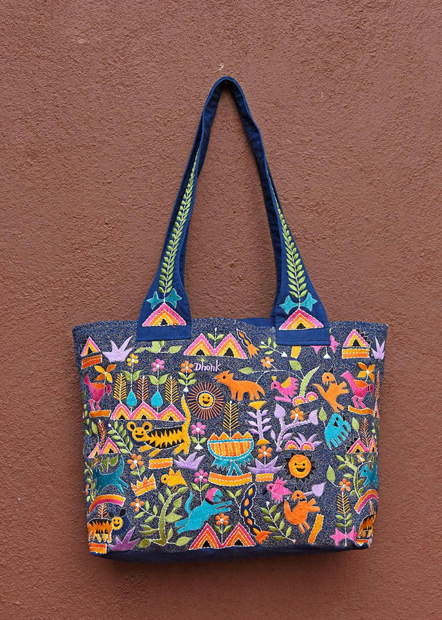 Colorful handcrafted tote bag with wildlife embroidery by Dhonk Craft, organic cotton artisan design