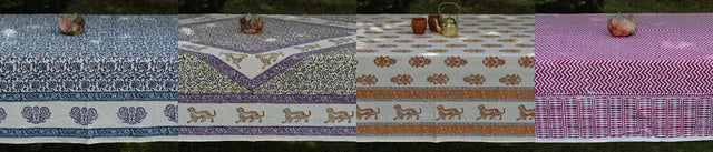 Handcrafted organic cotton tablecloths by Dhonk Craft, featuring vibrant block prints and nature-inspired patterns, displayed outdoors.