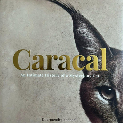 Book cover featuring a caracal wild cat with gold text, supporting Dhonk Craft wildlife conservation.