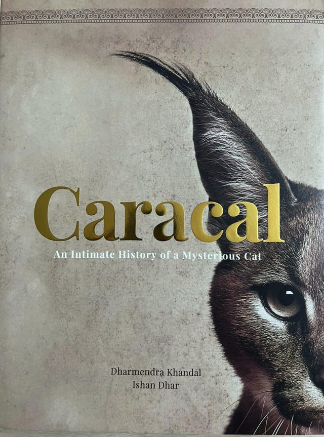 Book cover featuring a caracal wild cat with gold text, supporting Dhonk Craft wildlife conservation.