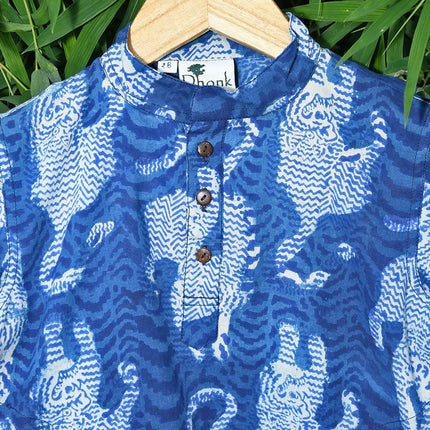 Handcrafted blue indigo cotton kurta with tiger print by Dhonk Craft, sustainable fashion.